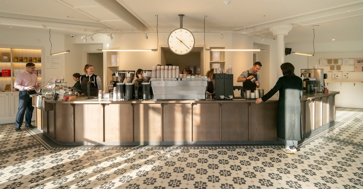 alt-="rosslyn cafe in london, inside one of their cafe's"